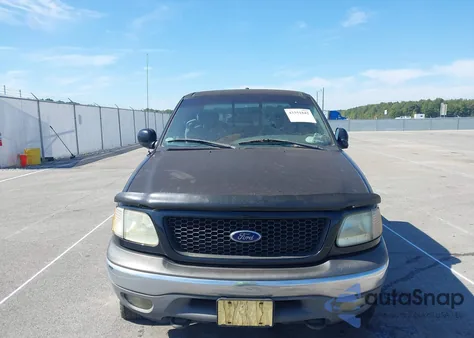 2002 Ford F150 из США, поврежденный, VIN 1FTRX18L72NA95797